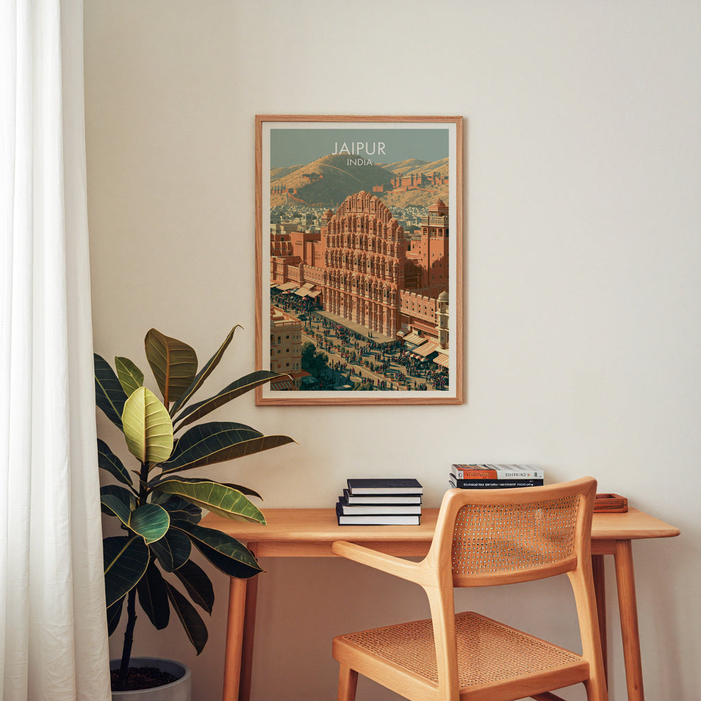 Hawa Mahal Jaipur India wall art above a wooden home office desk with a rattan chair and books