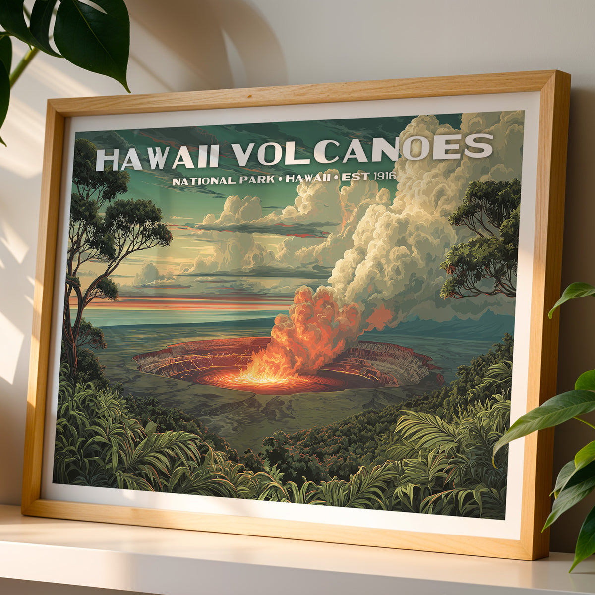 Hawaiʻi Volcanoes National Park wall art print in a light oak frame, leaning on a white shelf in warm sunlight beside a monstera plant