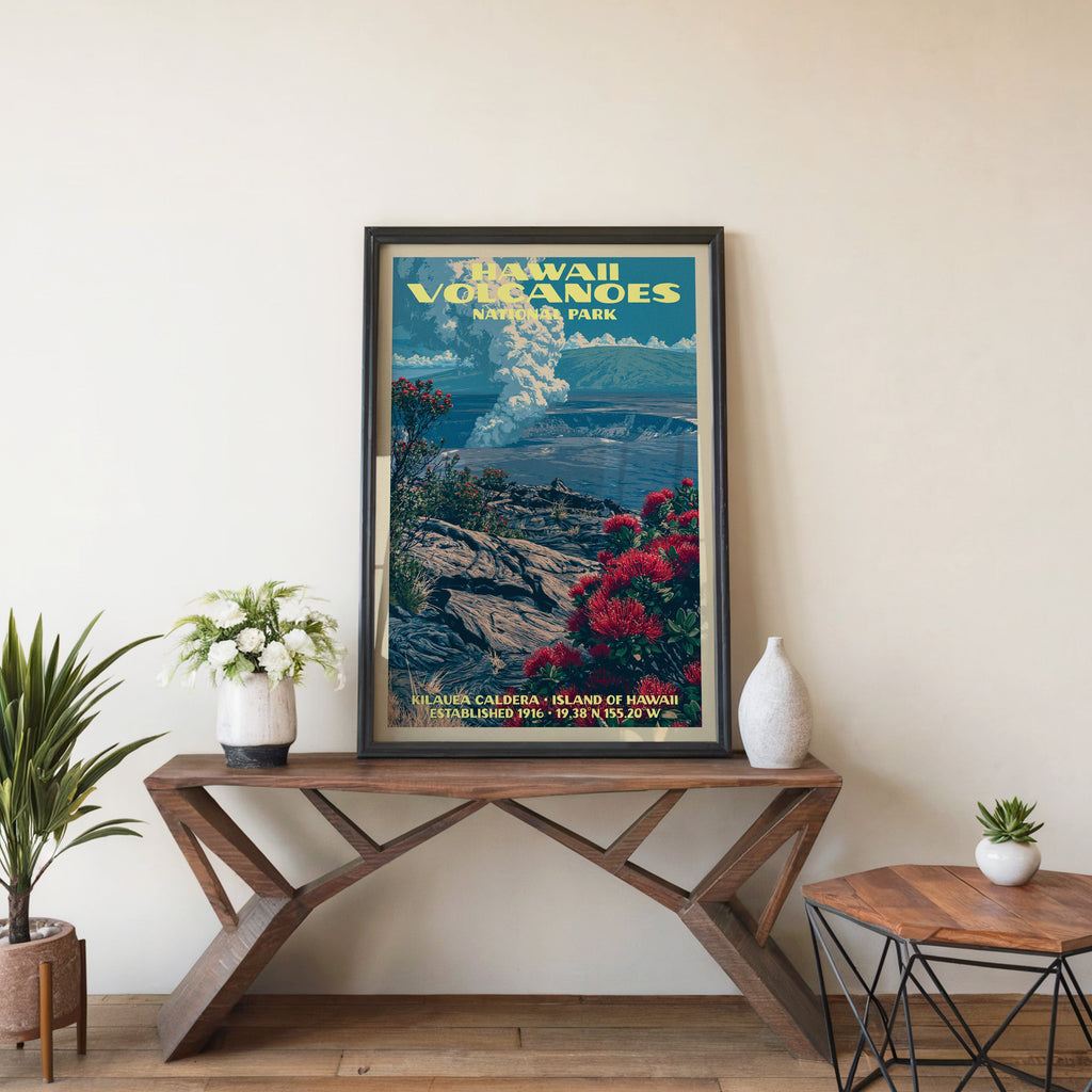 Kilauea Caldera wall art in a black frame, leaning on a walnut console with white anemones in a stoneware vase