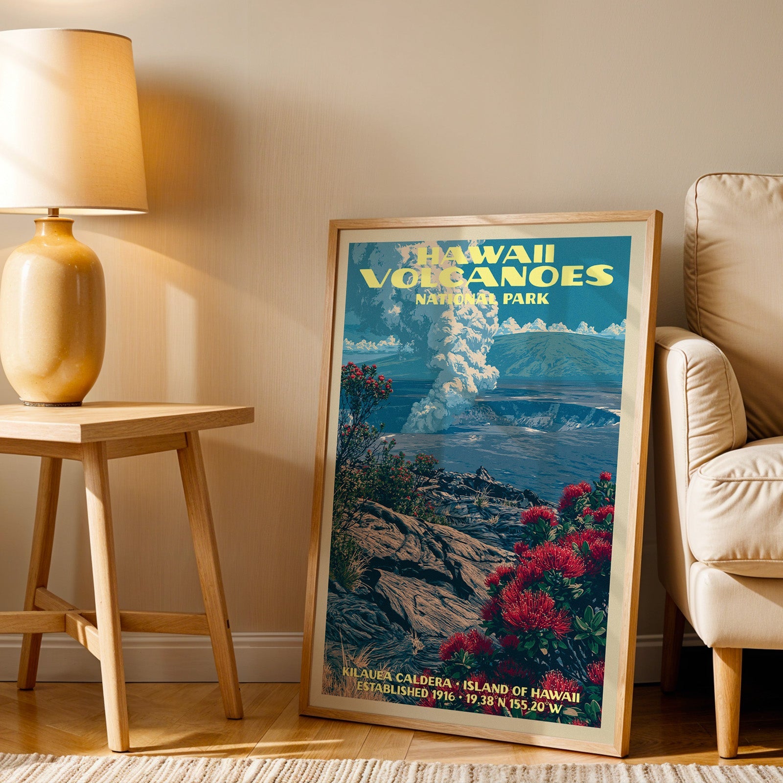 Big Island volcano wall art in oak, leaning by a cream armchair and a side table with an ochre ceramic lamp