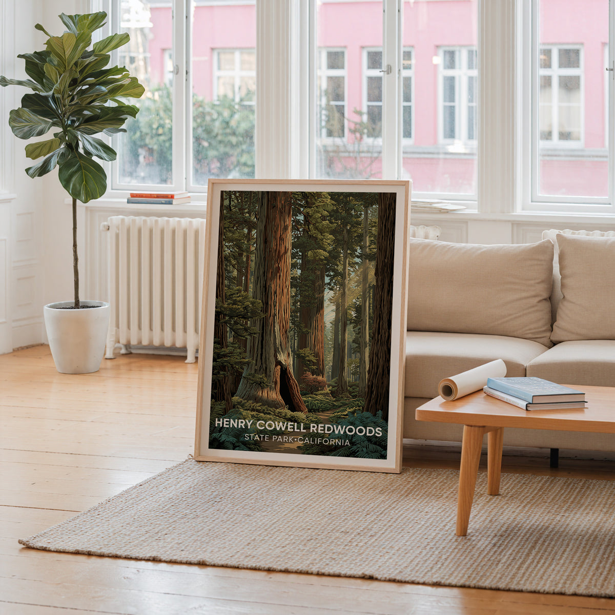 Fern and redwood print in oak leaning by a window facing a pink facade above a radiator