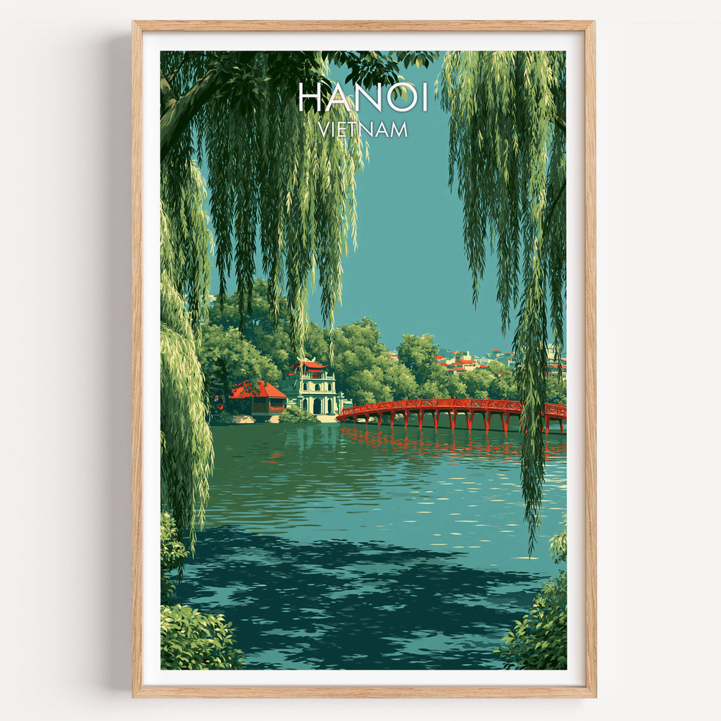 Hoan Kiem Lake Hanoi Vietnam travel poster in a natural wood frame, shown against a clean white wall