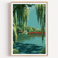 Hoan Kiem Lake Hanoi Vietnam travel poster in a natural wood frame, shown against a clean white wall