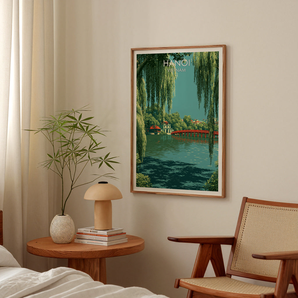 Hoan Kiem Lake Hanoi Vietnam poster above a bedroom nightstand with a bamboo plant and mushroom lamp