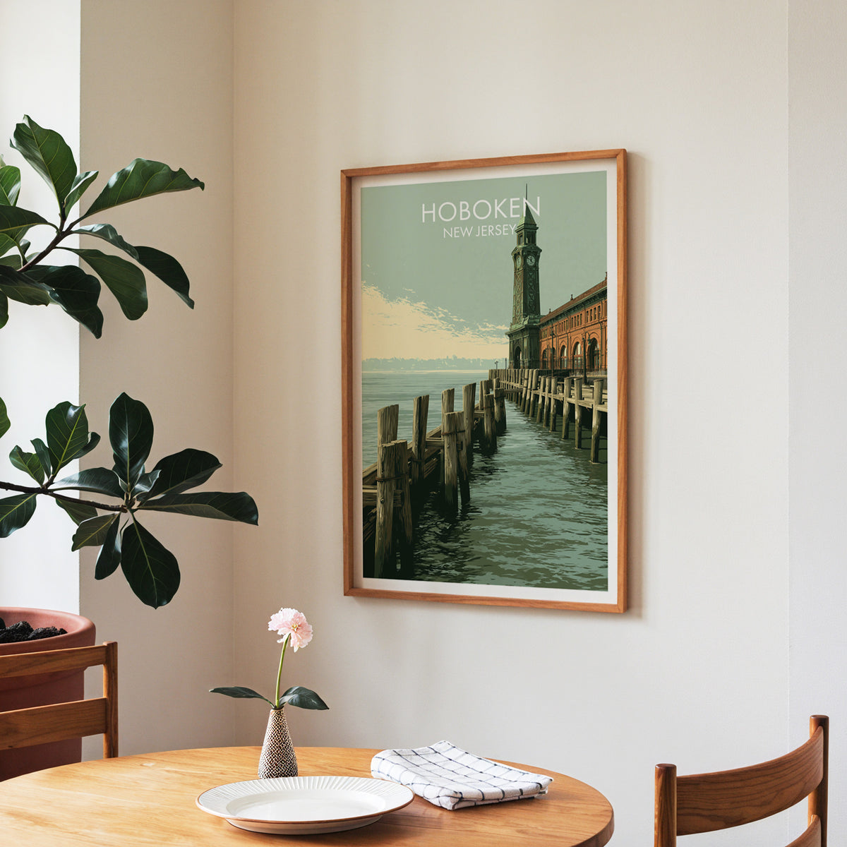 New Jersey waterfront poster in a walnut frame in a dining corner with round table, checked runner and roses.