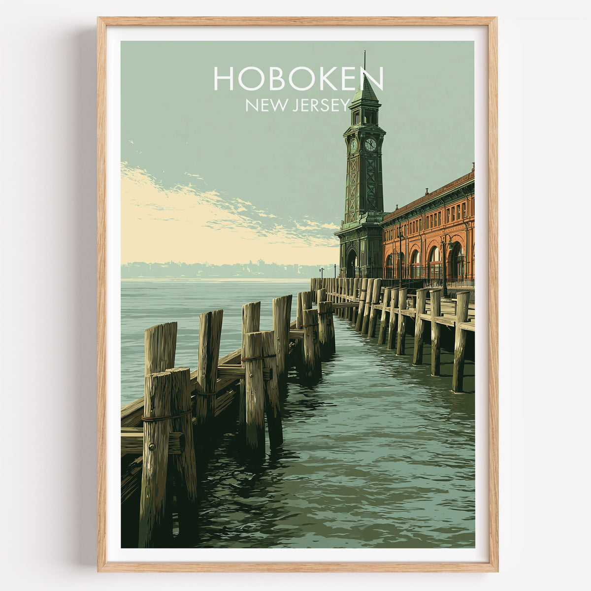 Hoboken clock tower travel poster in an oak frame on a plain white wall, lit straight on with a soft shadow.