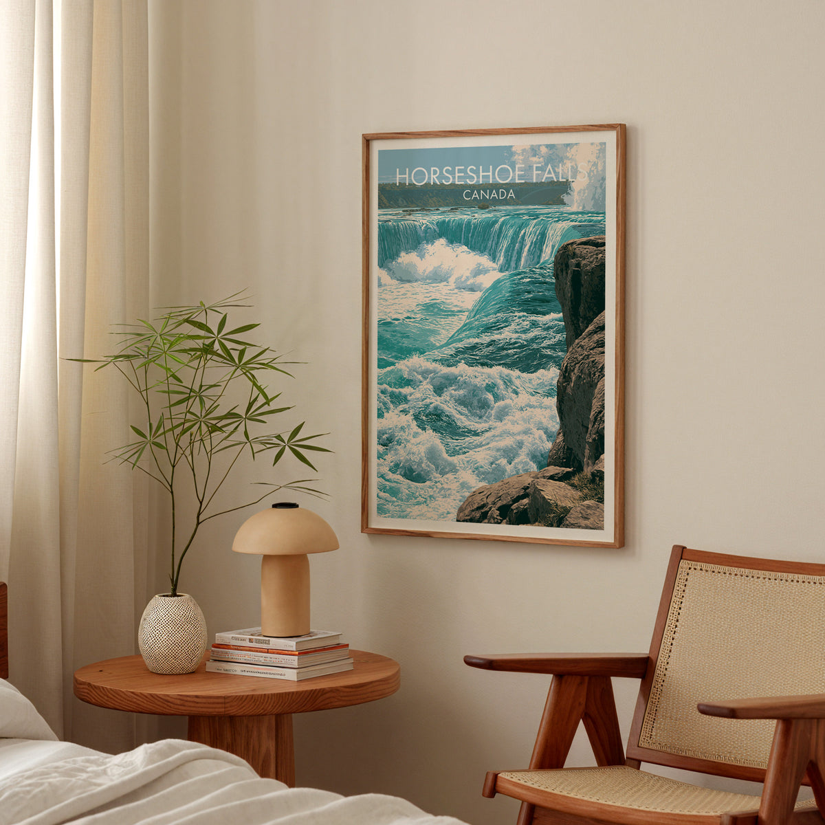 Horseshoe Falls Niagara poster in an oak frame above a bedside table with a mushroom lamp