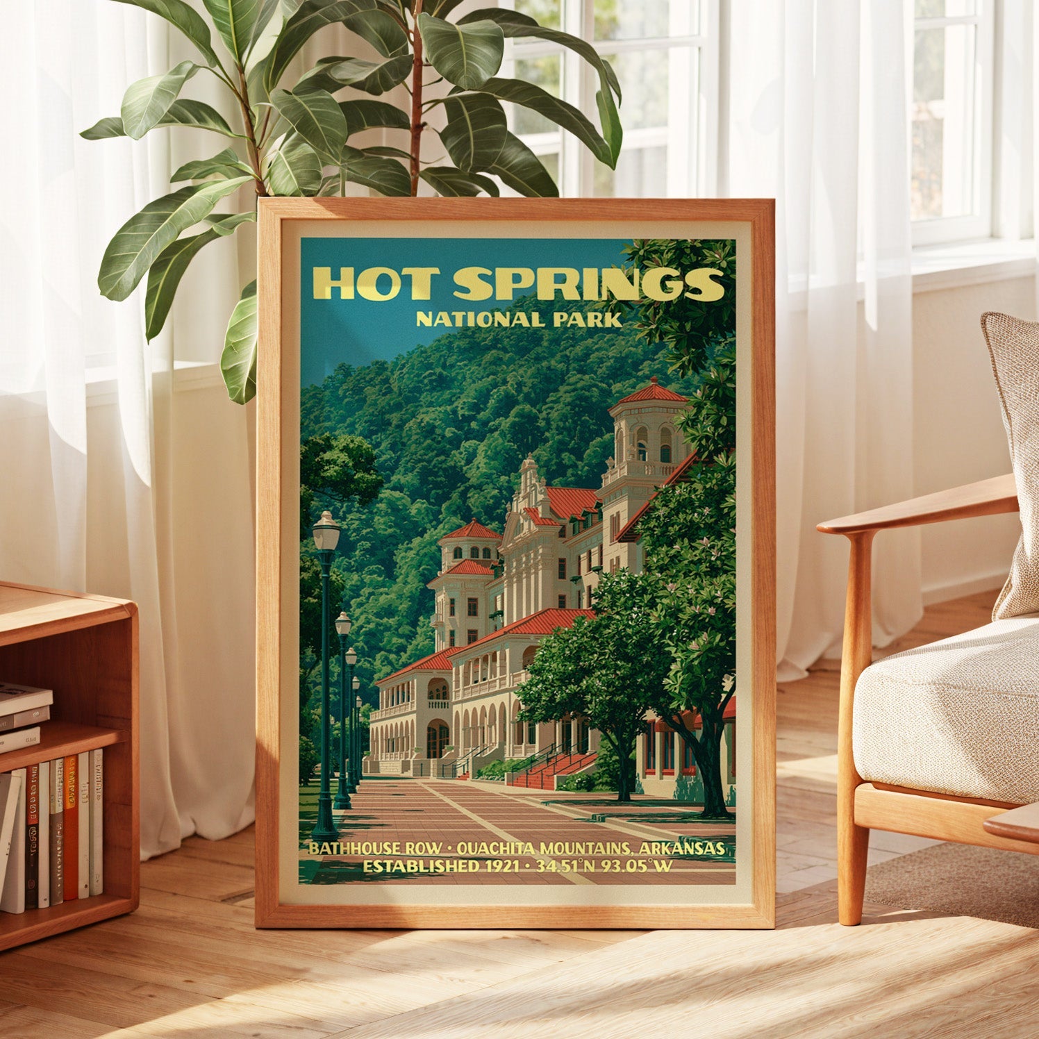Bathhouse Row poster in oak, leaning by a sunlit window with sheer curtains and a low bookshelf