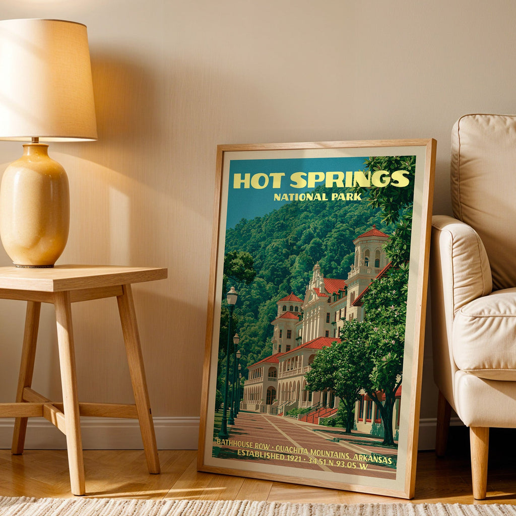 Arkansas bathhouse wall art in oak, leaning by a cream armchair and a side table with an ochre ceramic lamp