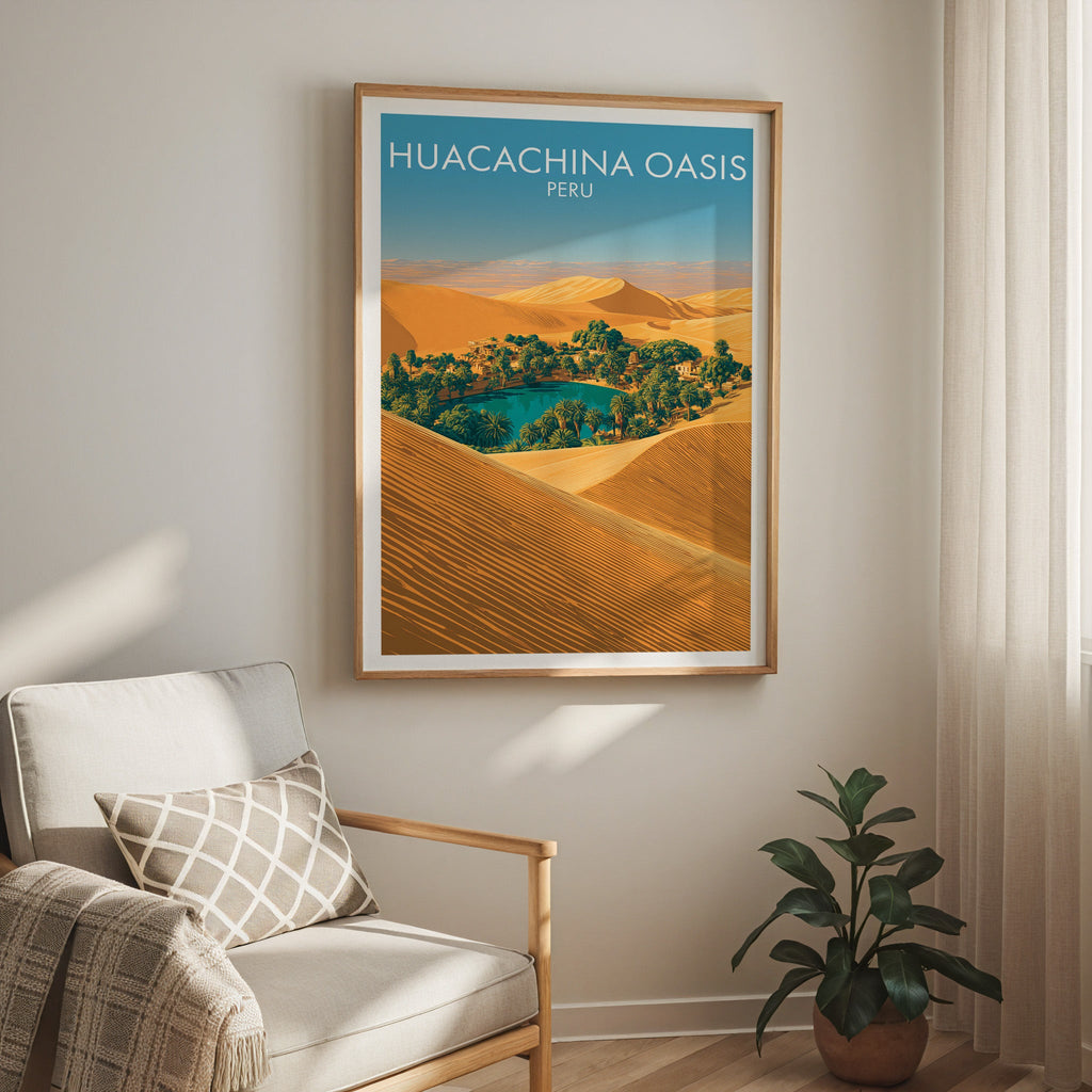 Huacachina poster in an oak frame over a cream armchair with a checked cushion, sheer curtains and plant