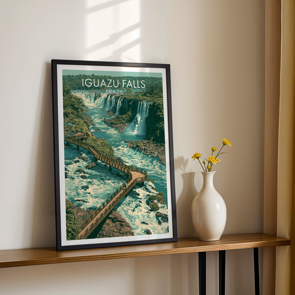 Brazil waterfall wall art in a black frame on a narrow wood shelf with yellow daisies in a white vase
