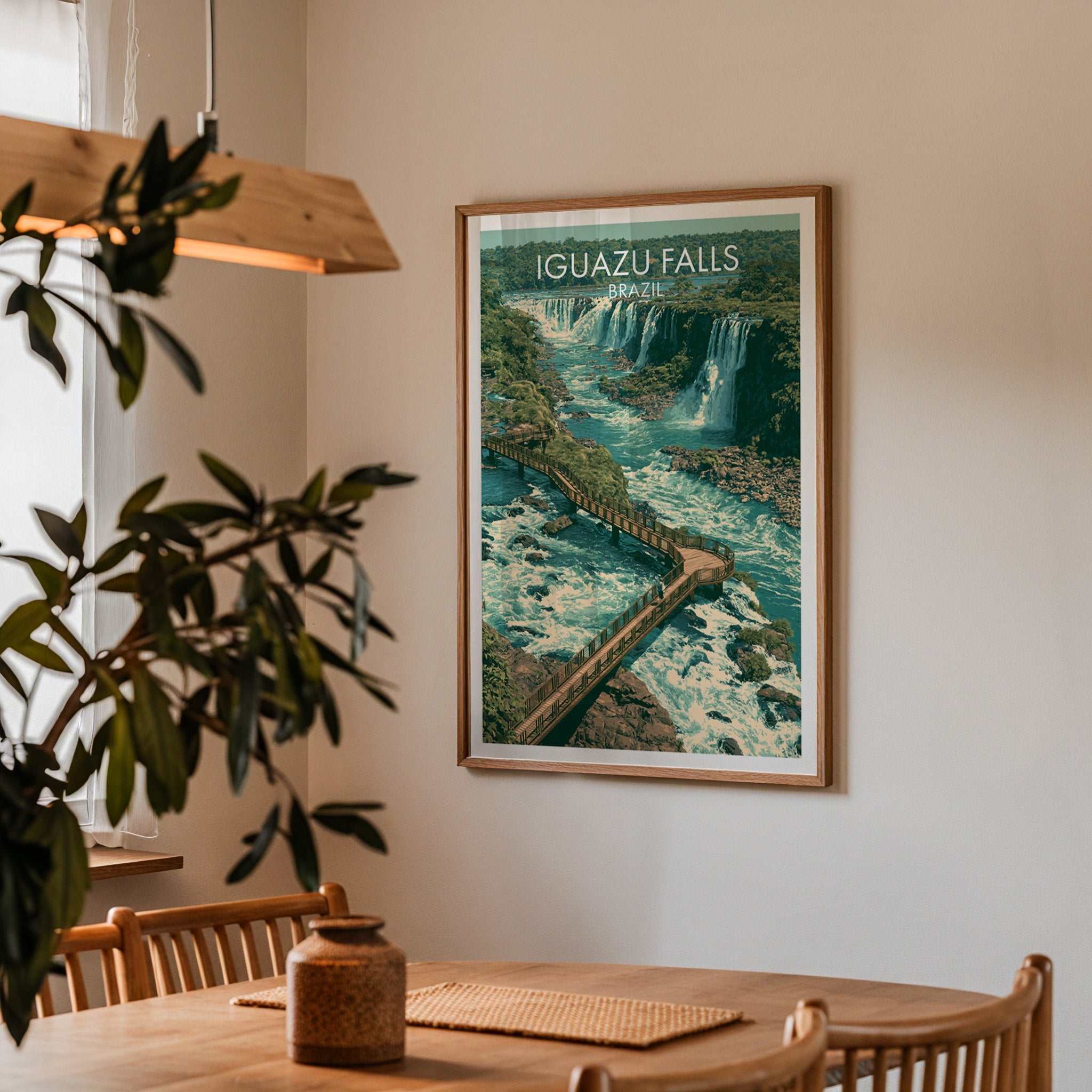 Turquoise river falls print in an oak frame in a dining corner with wood table, cane chairs and olive sprig