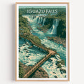 Iguazu Falls travel poster in a light oak frame on a plain white wall