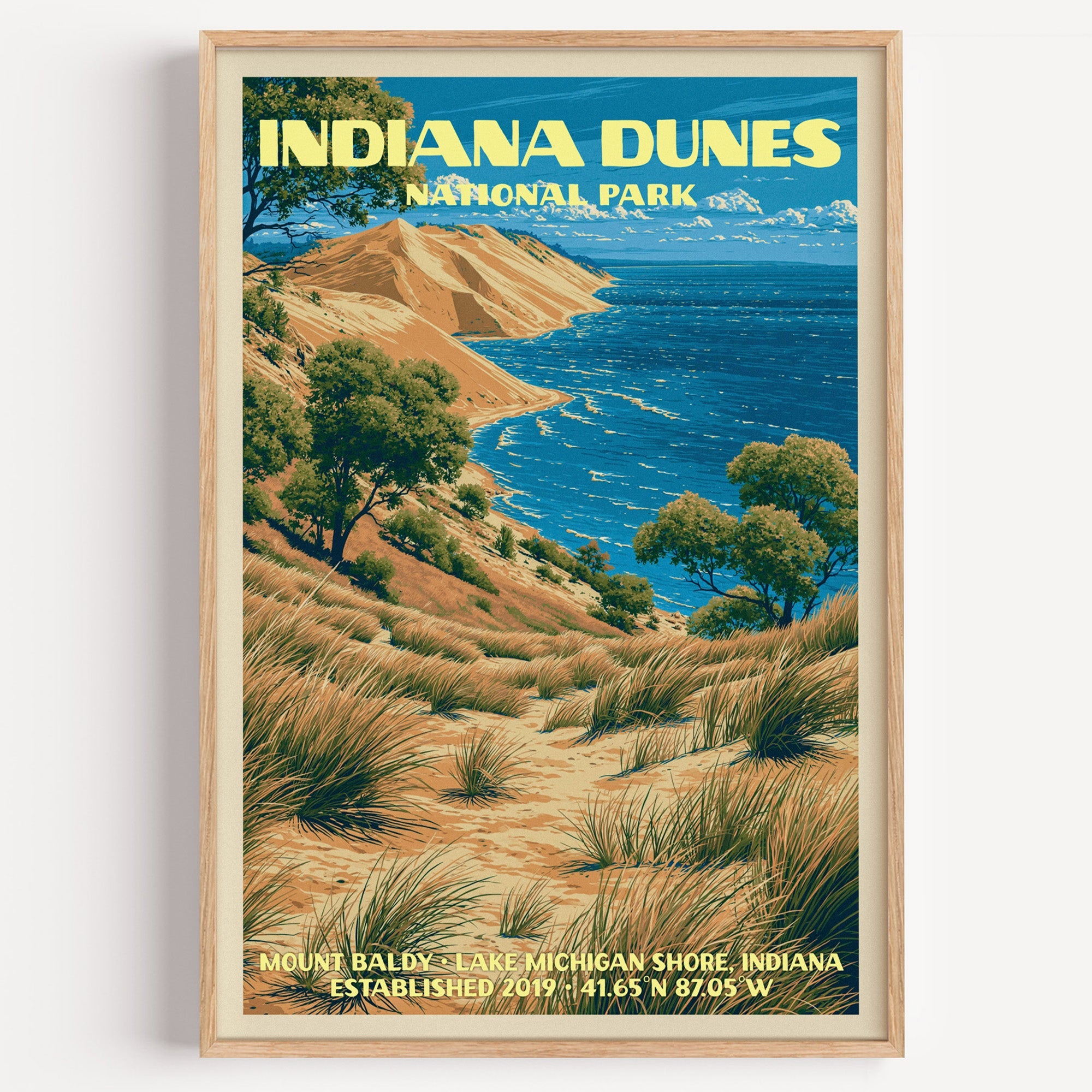 Mount Baldy Indiana Dunes National Park vintage poster in a light oak frame on a plain white wall
