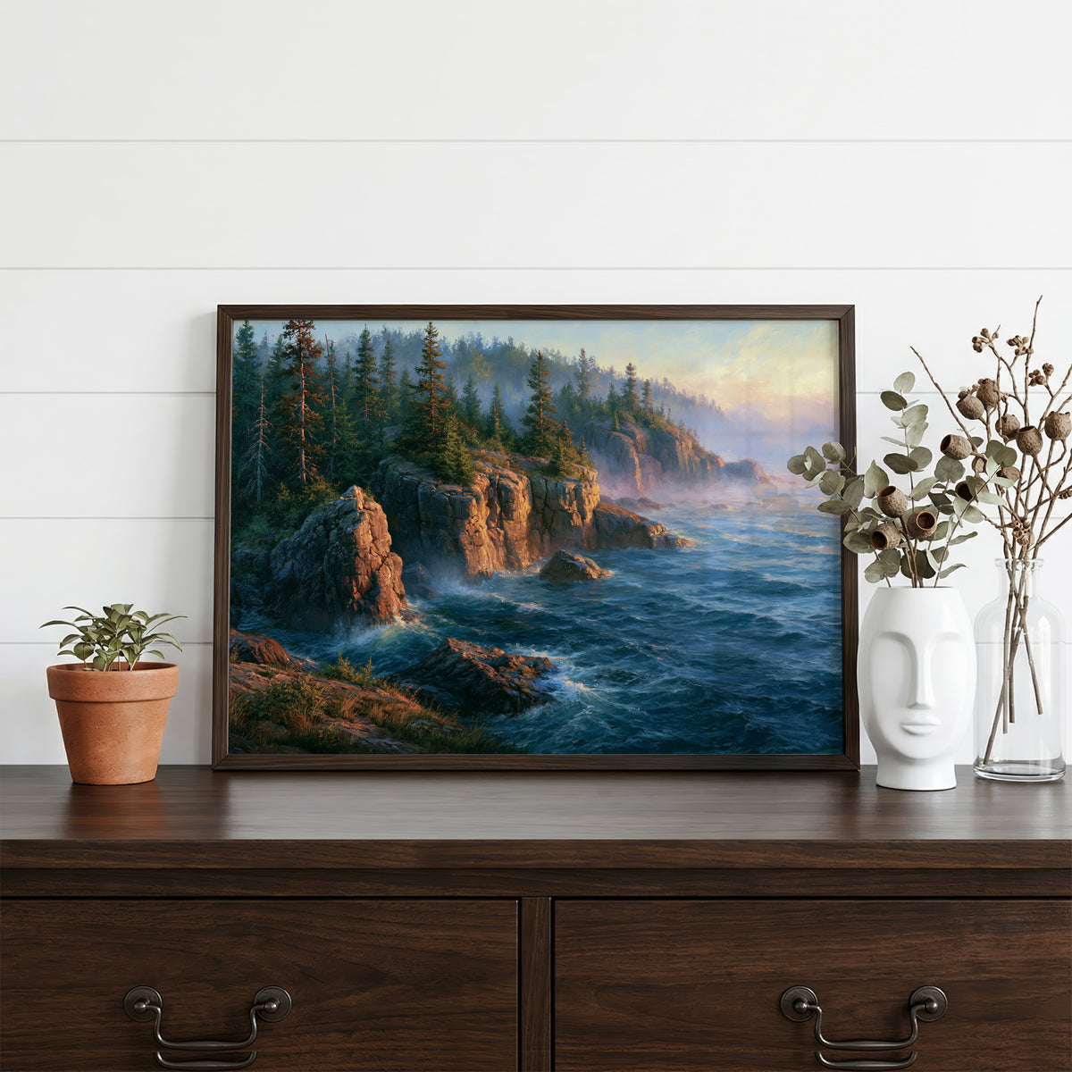 Isle Royale classical oil painting in a walnut frame resting on a dark wood dresser