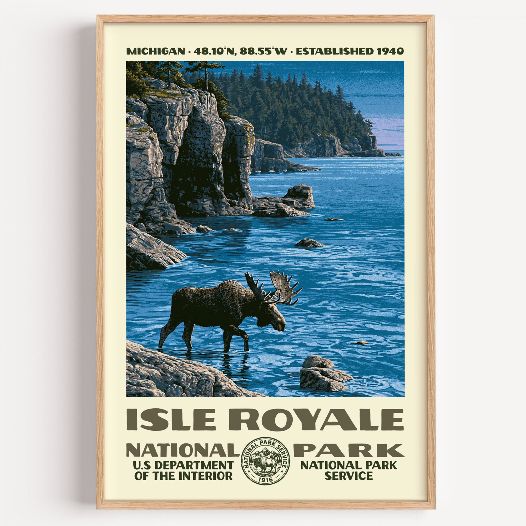 Isle Royale National Park vintage WPA poster in a wood frame, a bull moose wading a cove below basalt cliffs on Lake Superior