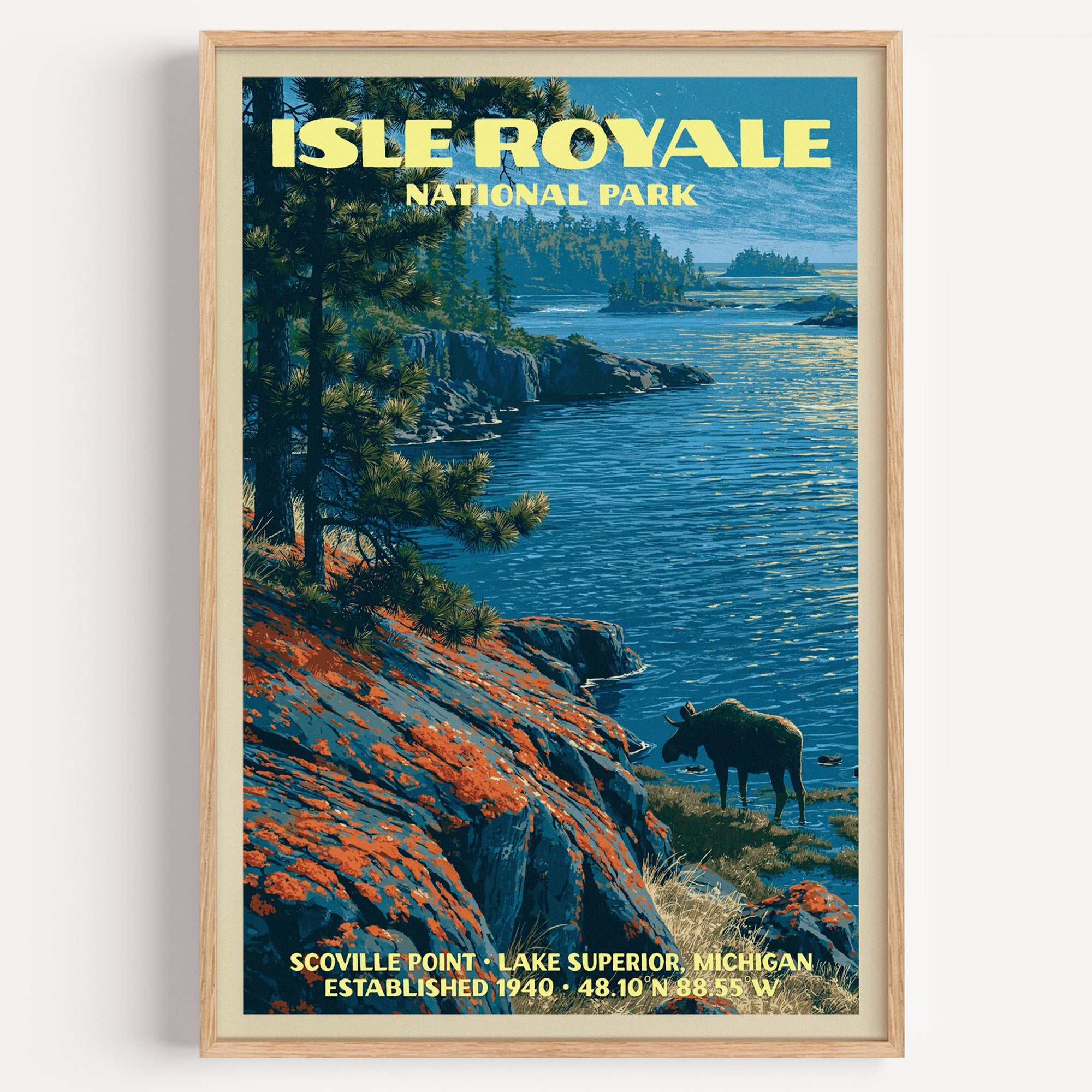 Scoville Point Isle Royale National Park vintage poster in a light oak frame on a plain white wall