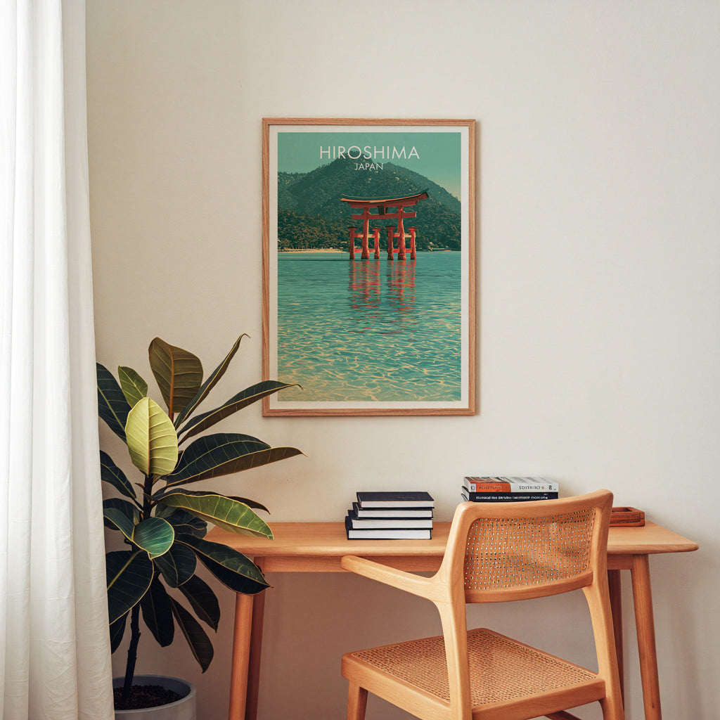 Itsukushima Shrine Miyajima Japan wall art above a wooden home office desk with a rattan chair and books