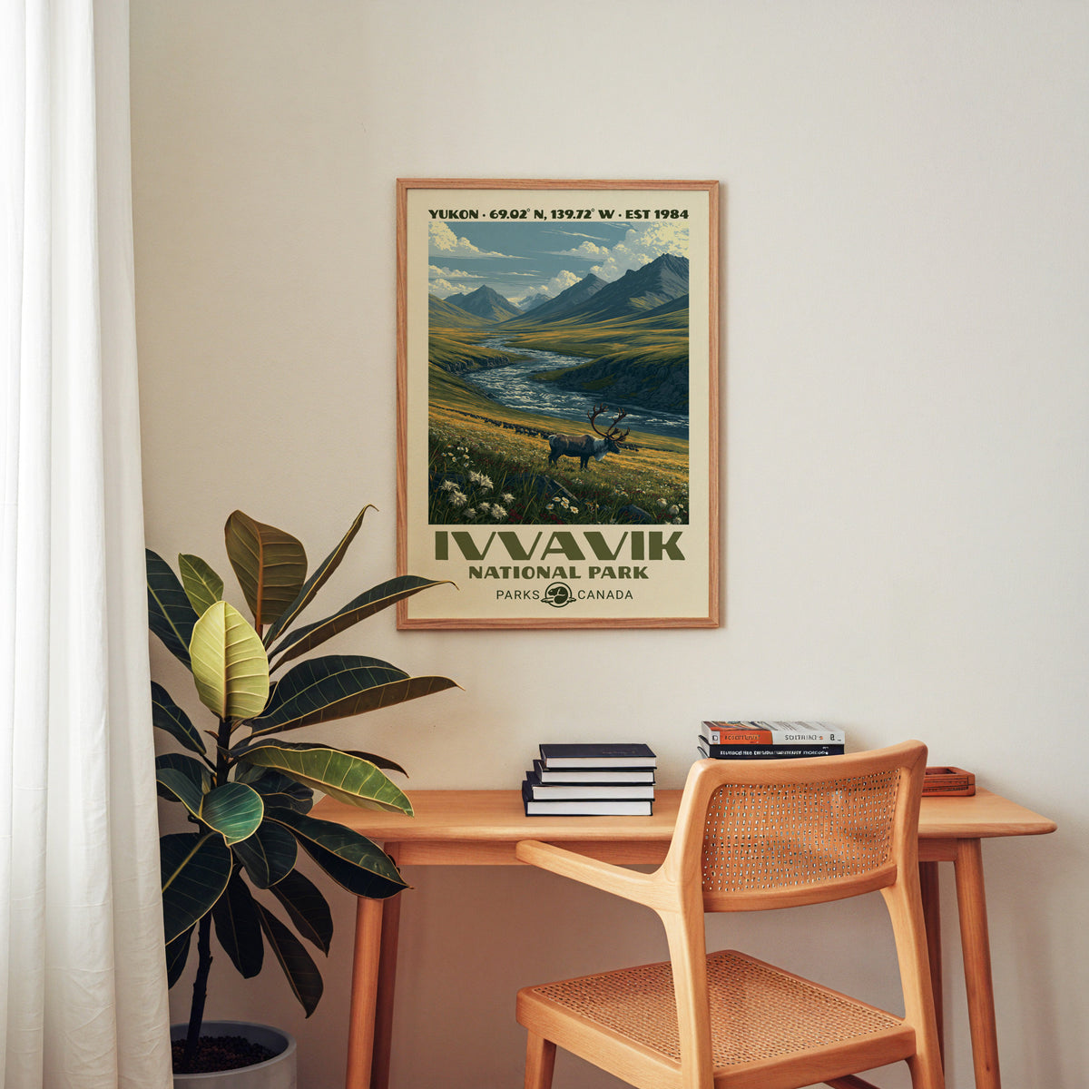 Ivvavik National Park canvas print in an oak frame above a wood desk with a cane chair