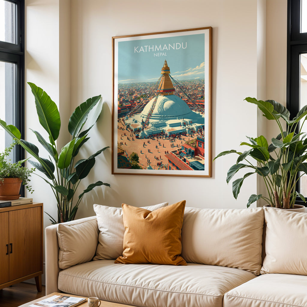 Framed Kathmandu Nepal wall art hanging above a cream sofa in a bright living room with tropical plants