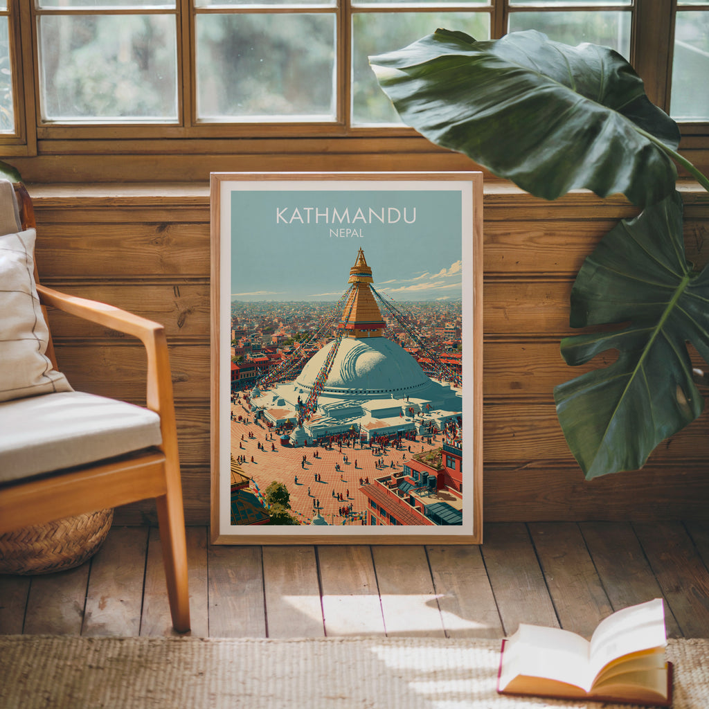 Framed Kathmandu Nepal poster leaning against a timber cabin wall with monstera leaves and an open book
