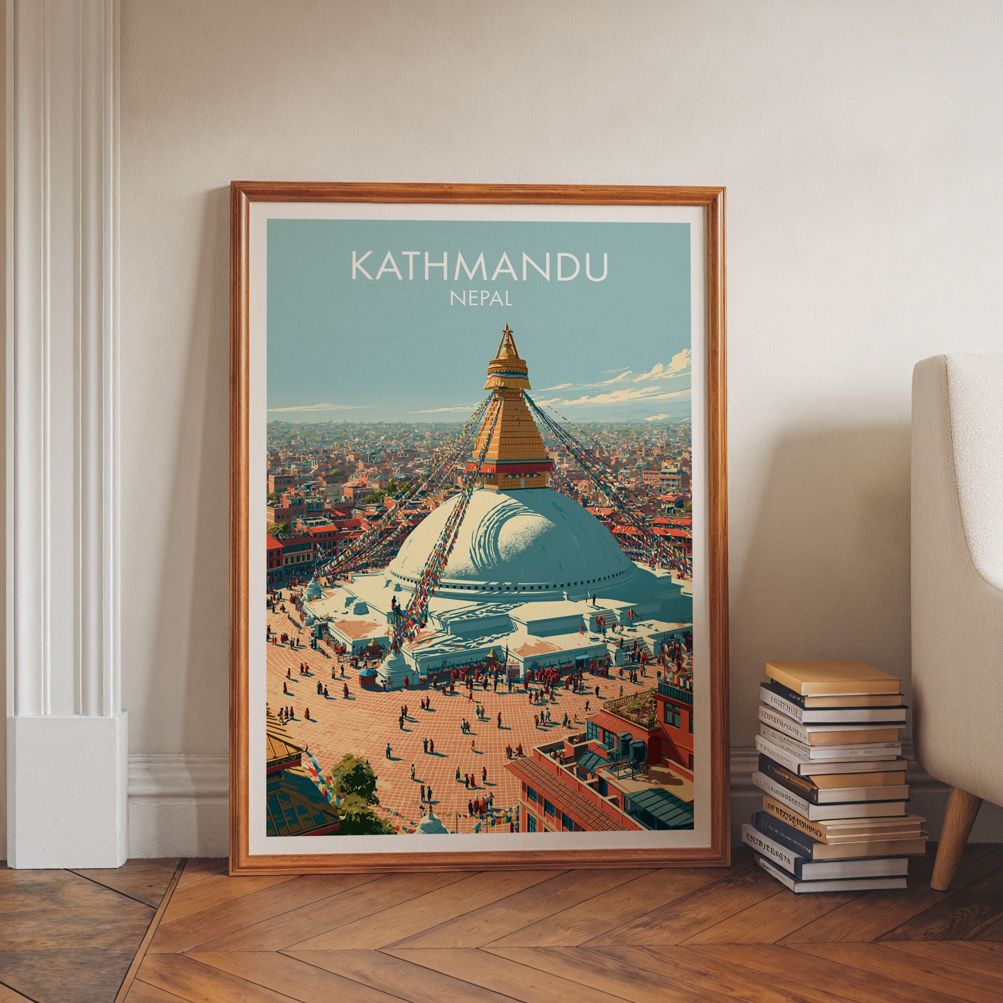 Kathmandu Nepal art print in a walnut frame leaning in a hallway beside stacked books