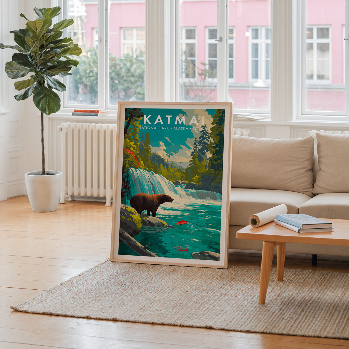 Katmai National Park mid-century modern art print propped in a neutral living room behind a low oak coffee table — living room wall art