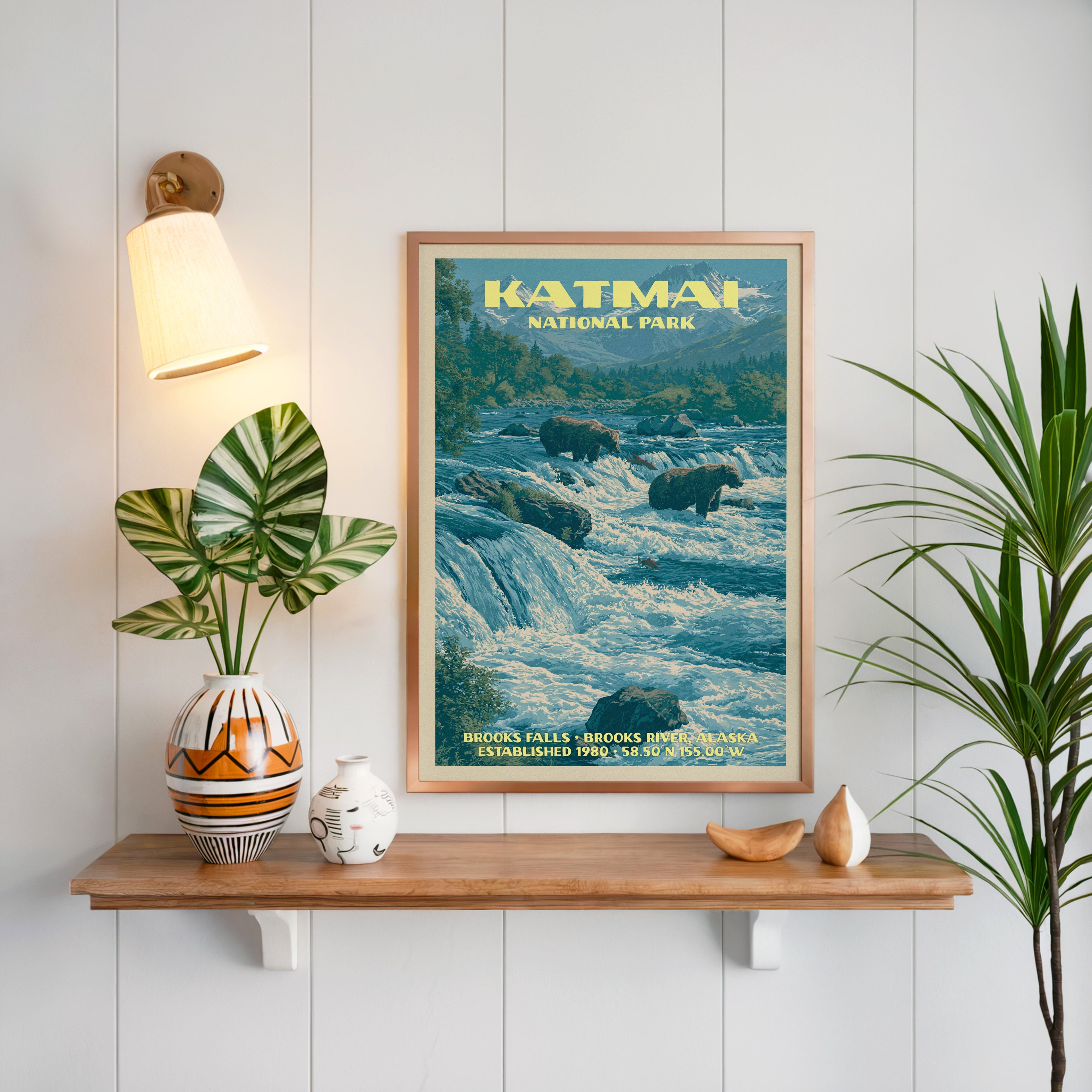 Brooks Falls Katmai print framed on white panelling above an oak shelf with a patterned vase and sconce