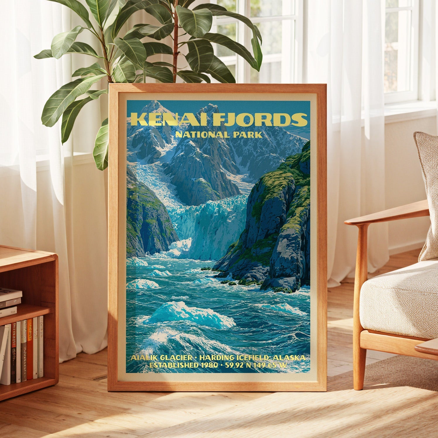 Kenai Fjords vintage poster in oak, leaning by a sunlit window with sheer curtains and a low bookshelf