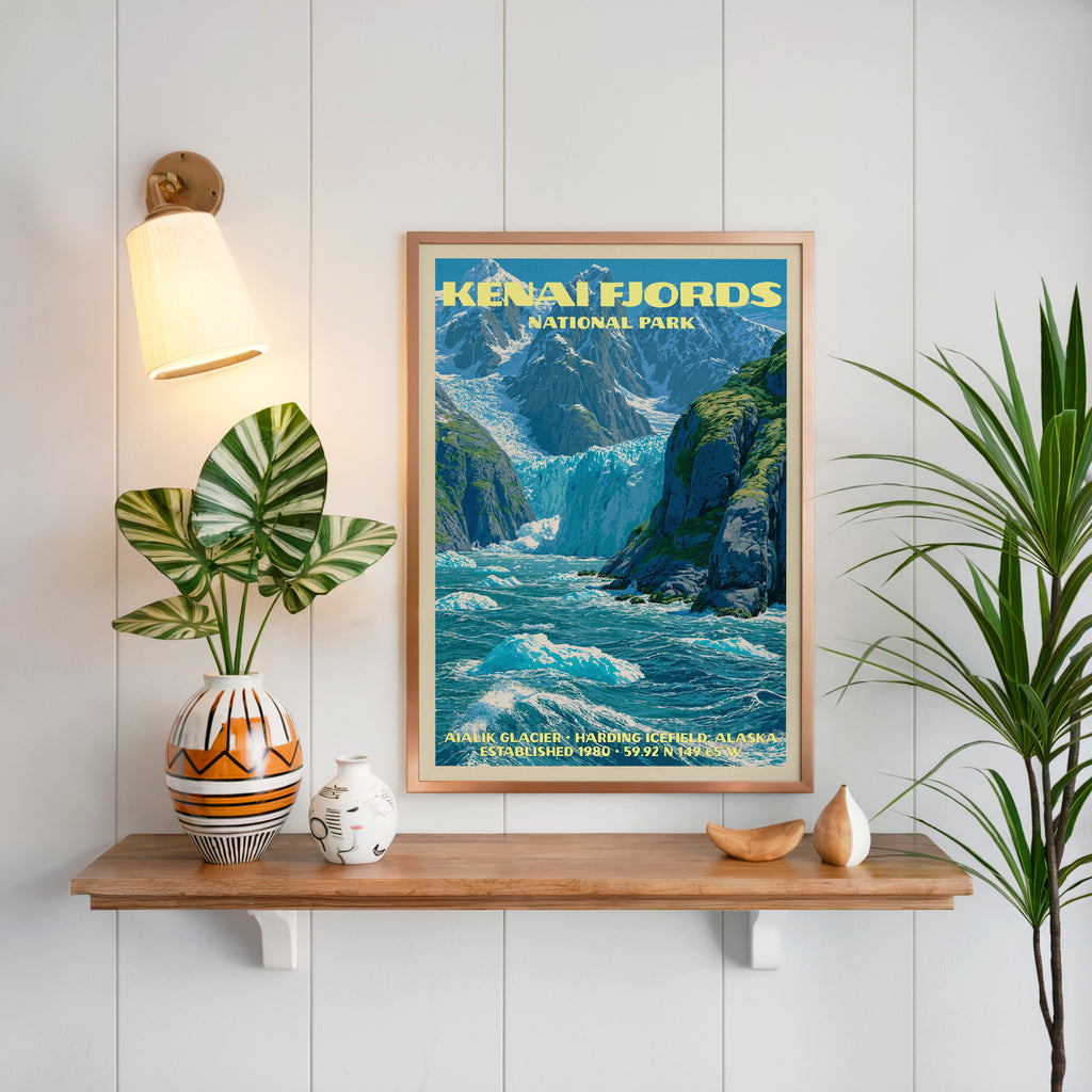 Aialik Glacier Kenai Fjords print framed on white panelling above an oak shelf with a patterned vase and sconce