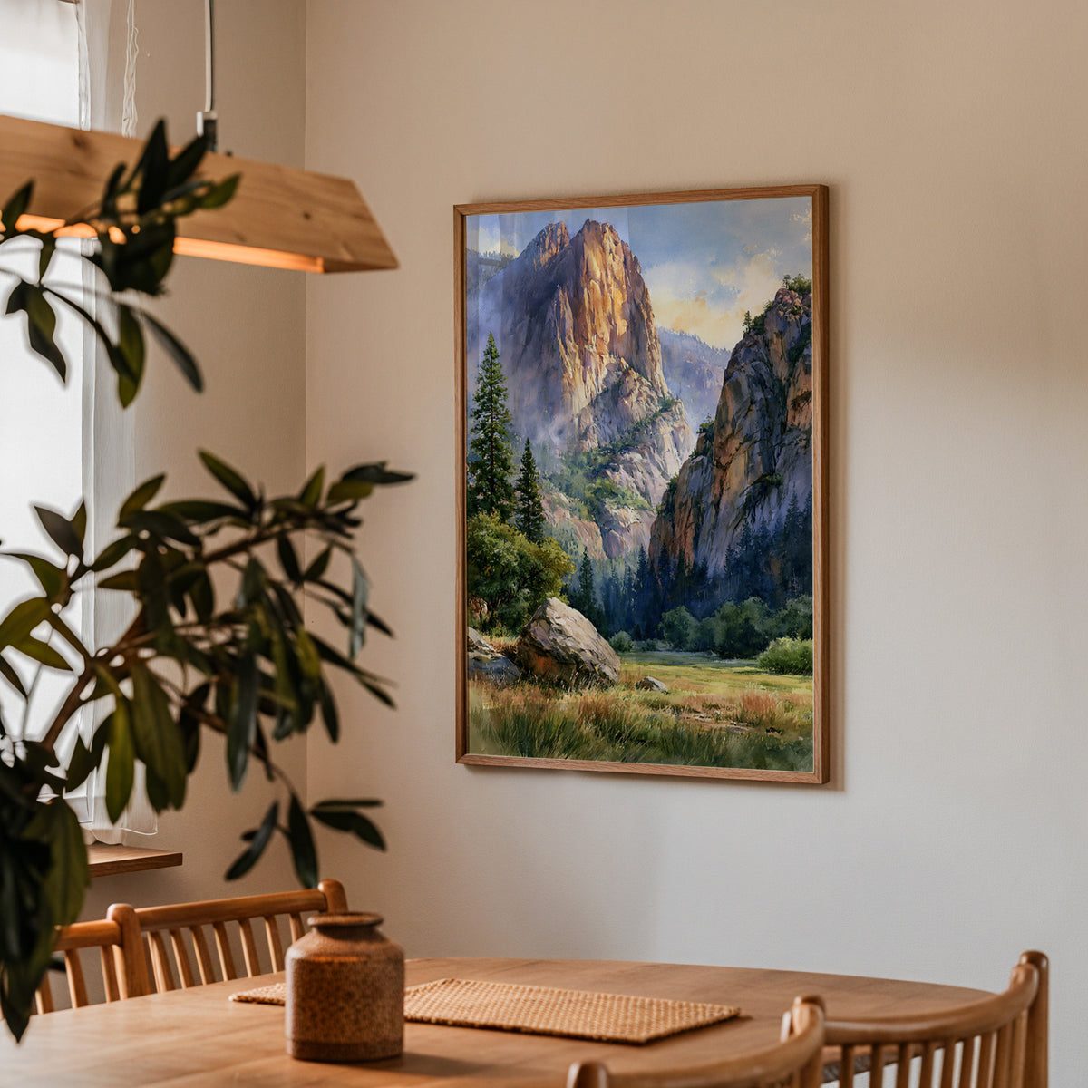 Kings Canyon National Park watercolor print in an oak frame on a dining room wall above a wooden table