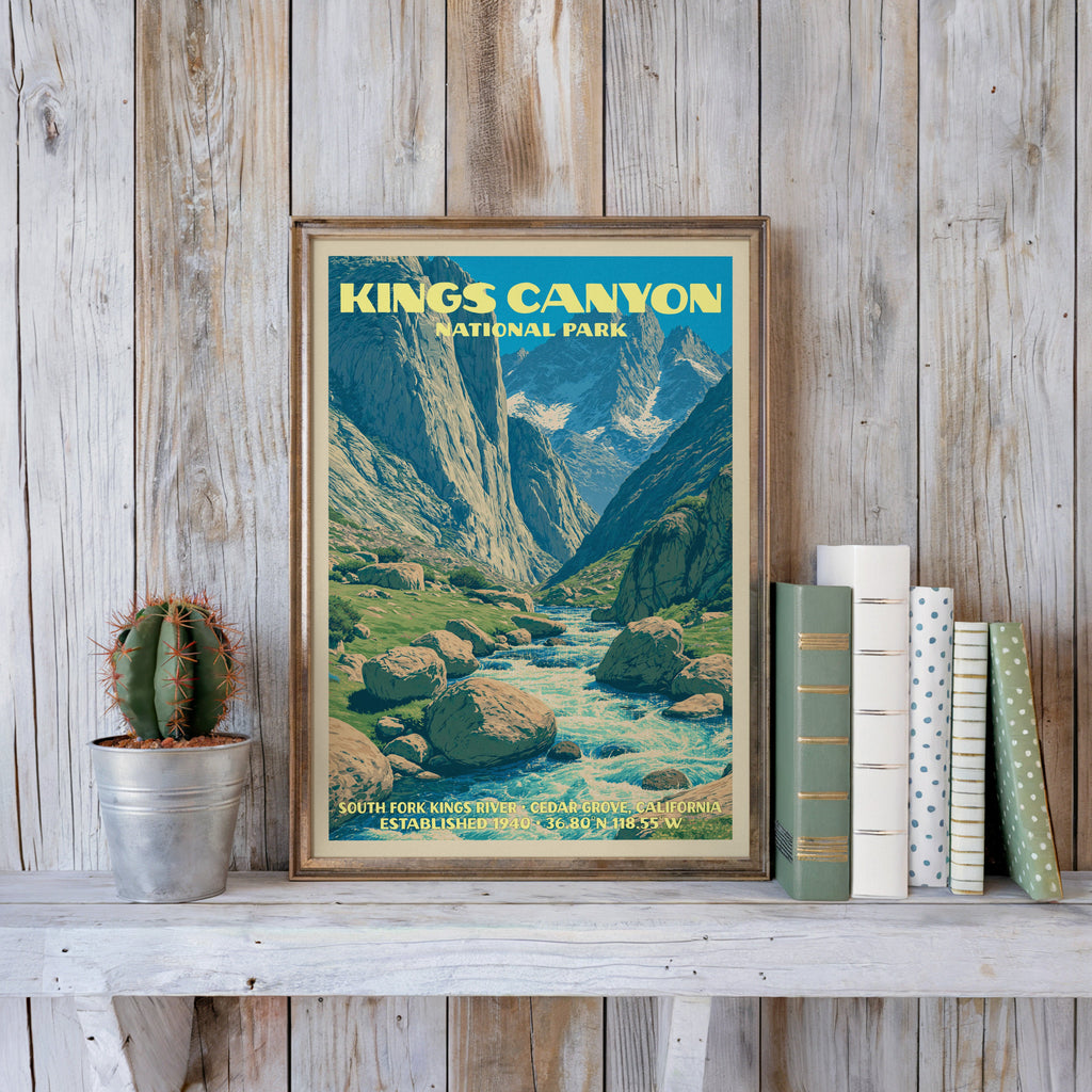 Kings Canyon vintage poster in a slim gold frame on a whitewashed plank wall beside a cactus and pastel books