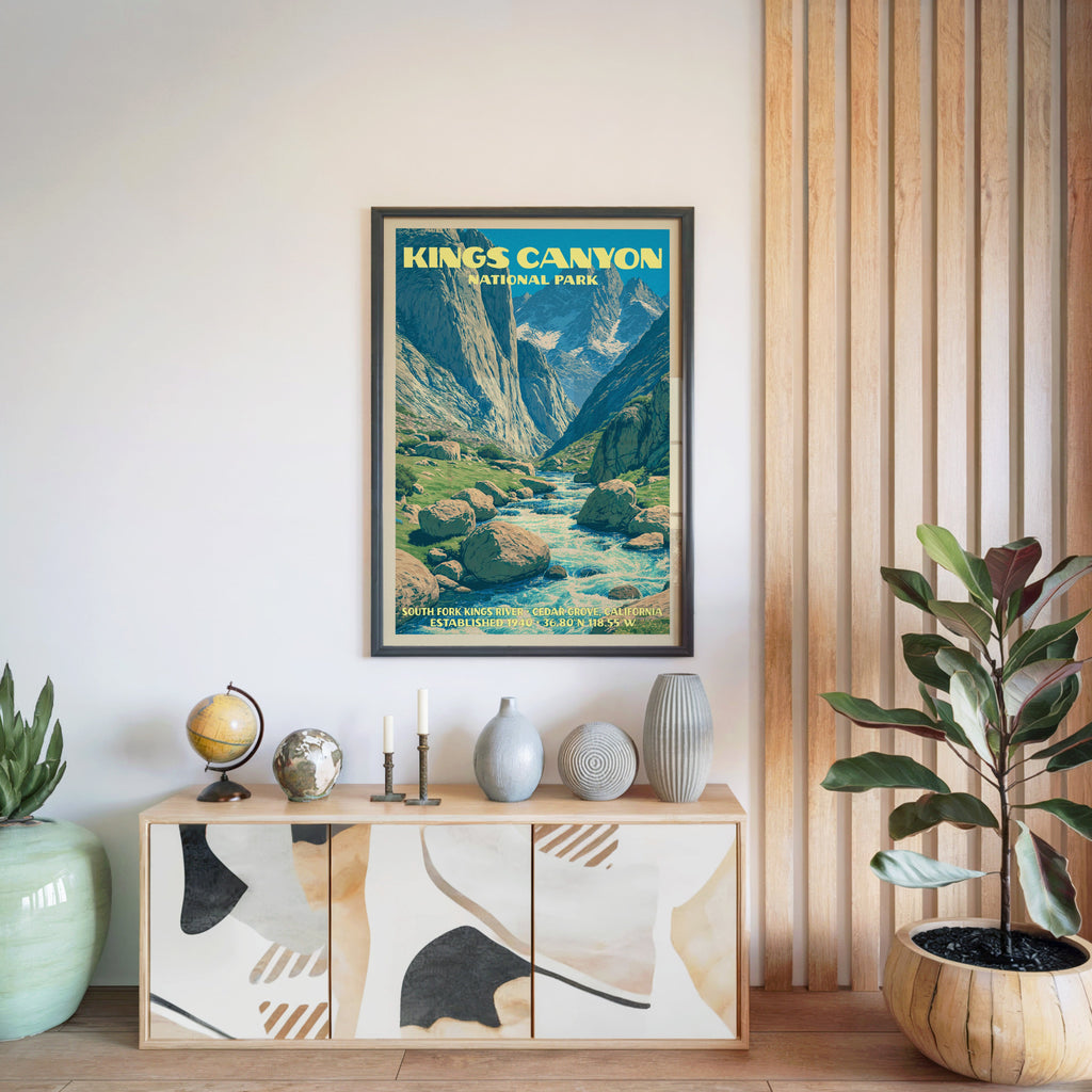 Kings Canyon National Park poster in a black frame above a light wood sideboard by a slatted wall panel