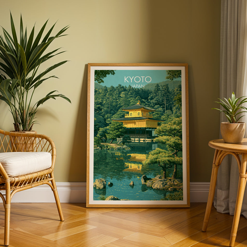 Large Kinkakuji Golden Pavilion Kyoto travel print in an oak frame leaning on a herringbone floor next to a rattan chair