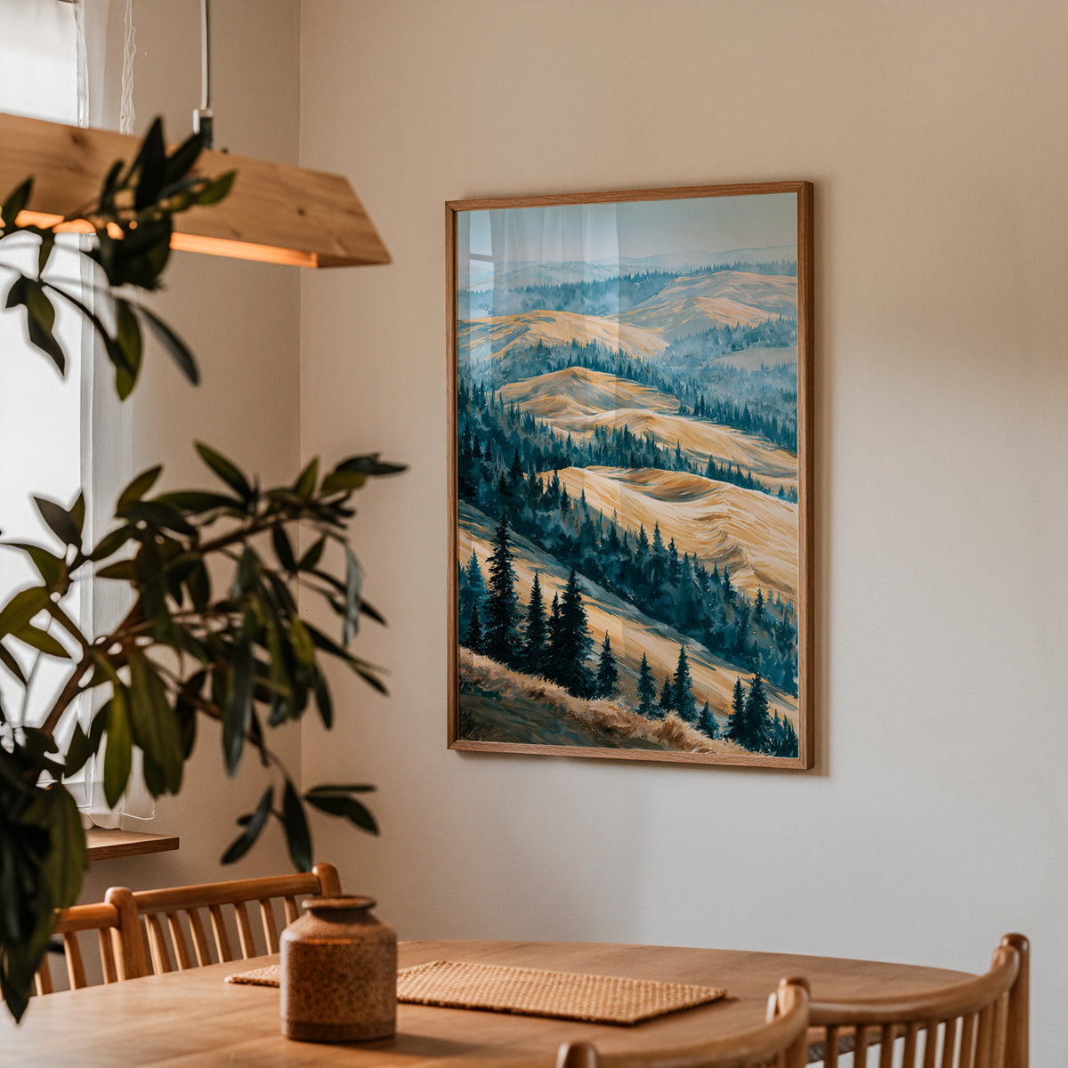 Kobuk Valley National Park watercolor print in an oak frame on a dining room wall above a wooden table