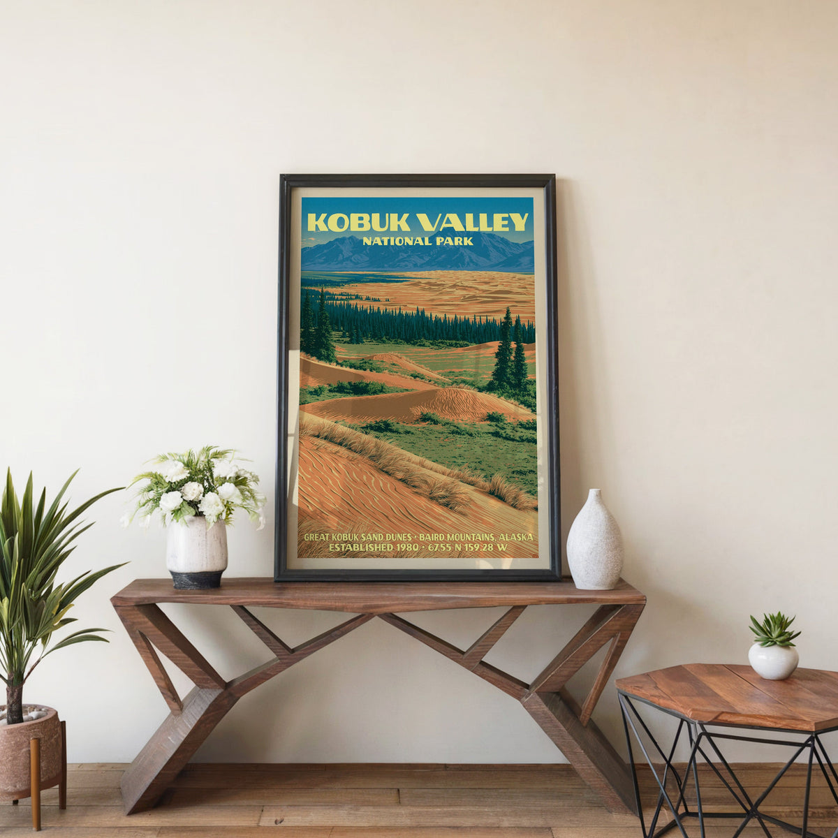 Kobuk Valley sand dunes wall art in black, leaning on a walnut console with white anemones and a vase