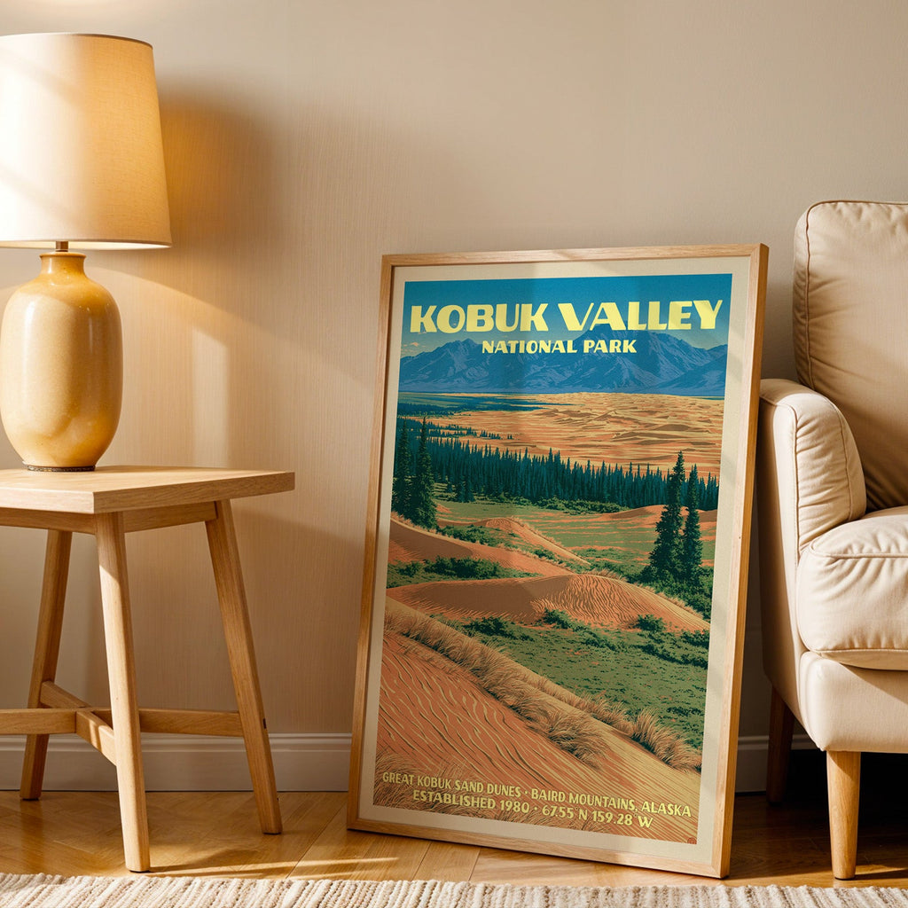 Great Kobuk Sand Dunes wall art in oak, leaning by an armchair and a side table with an ochre lamp