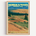 Great Kobuk Sand Dunes Kobuk Valley vintage poster in a light oak frame on a plain white wall