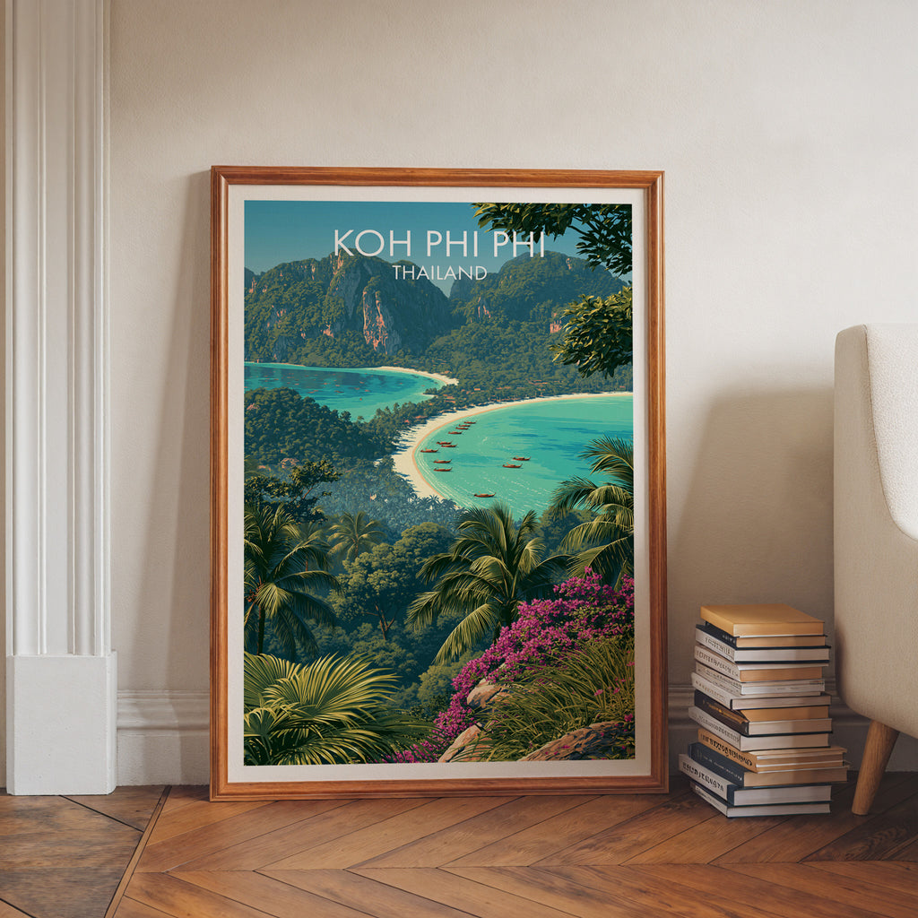 Koh Phi Phi Thailand art print in a walnut frame leaning in a hallway beside stacked books