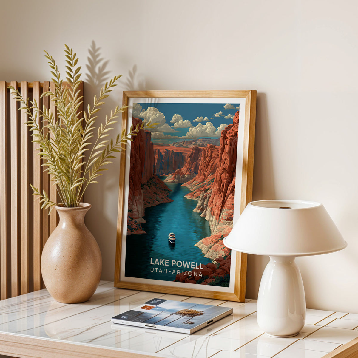Lake Powell wall art in oak on a stone table with a speckled vase, dried leaves and a white dome lamp.