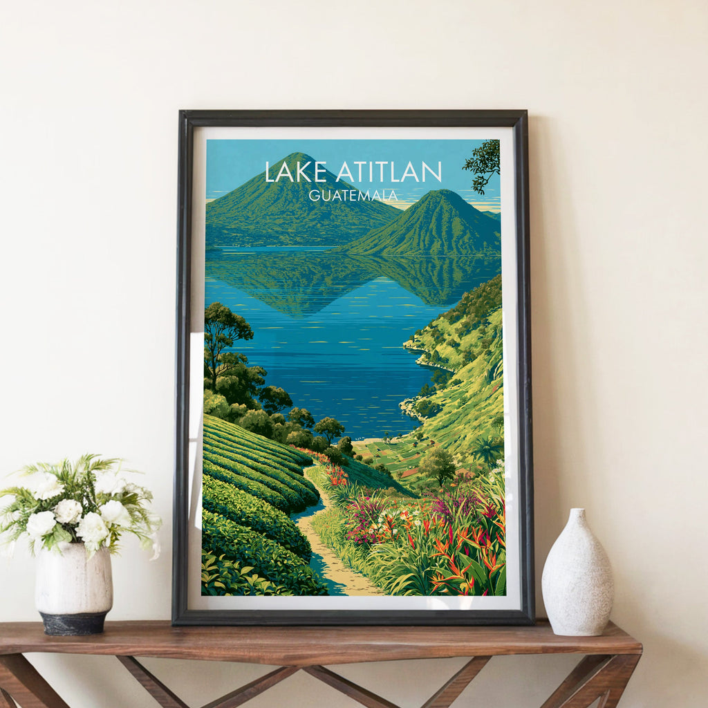 Two volcanoes mirrored in the lake, black frame on a walnut console between white peonies and a white ceramic vase