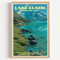 Crescent Lake Lake Clark National Park vintage poster in a light oak frame on a plain white wall