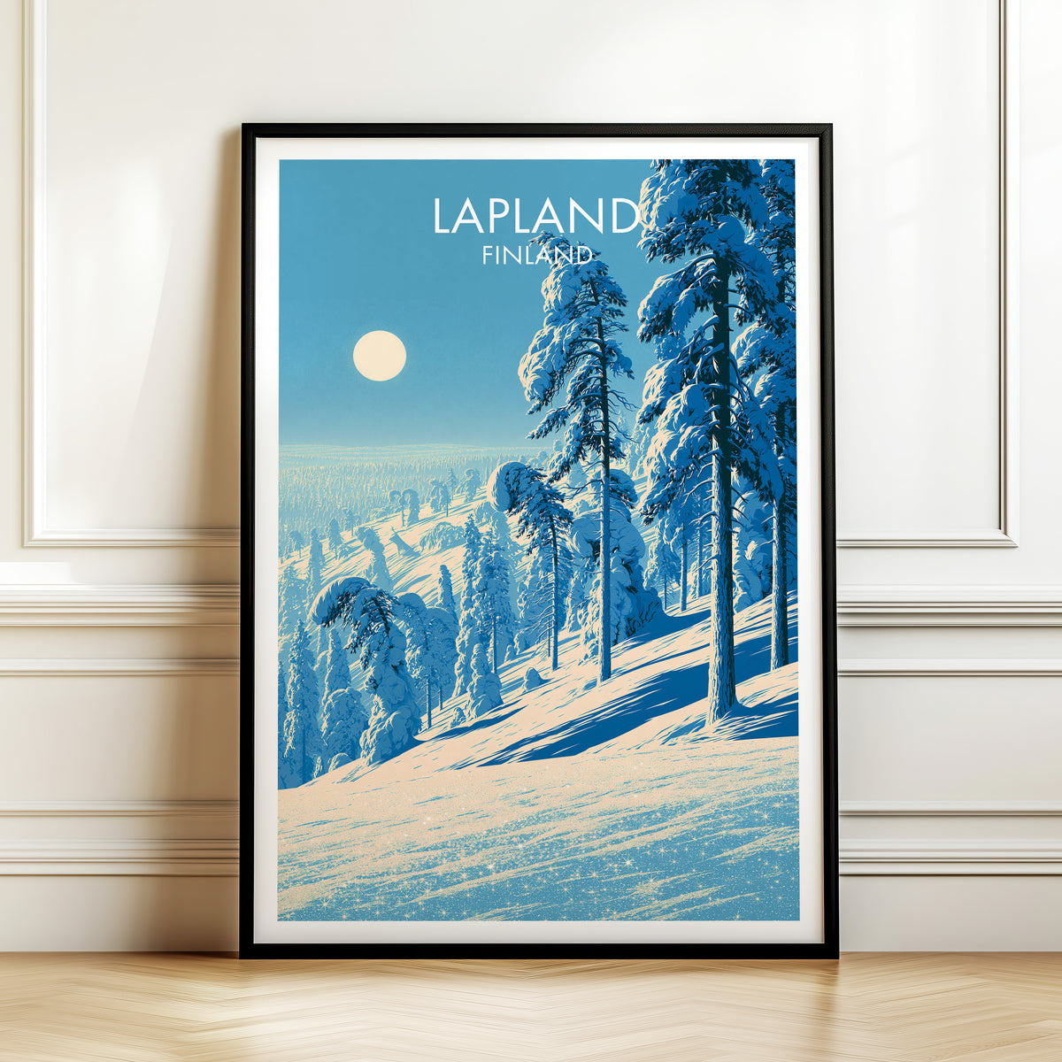 Lapland snow forest print, black frame leaning on a white panelled wall above a herringbone floor