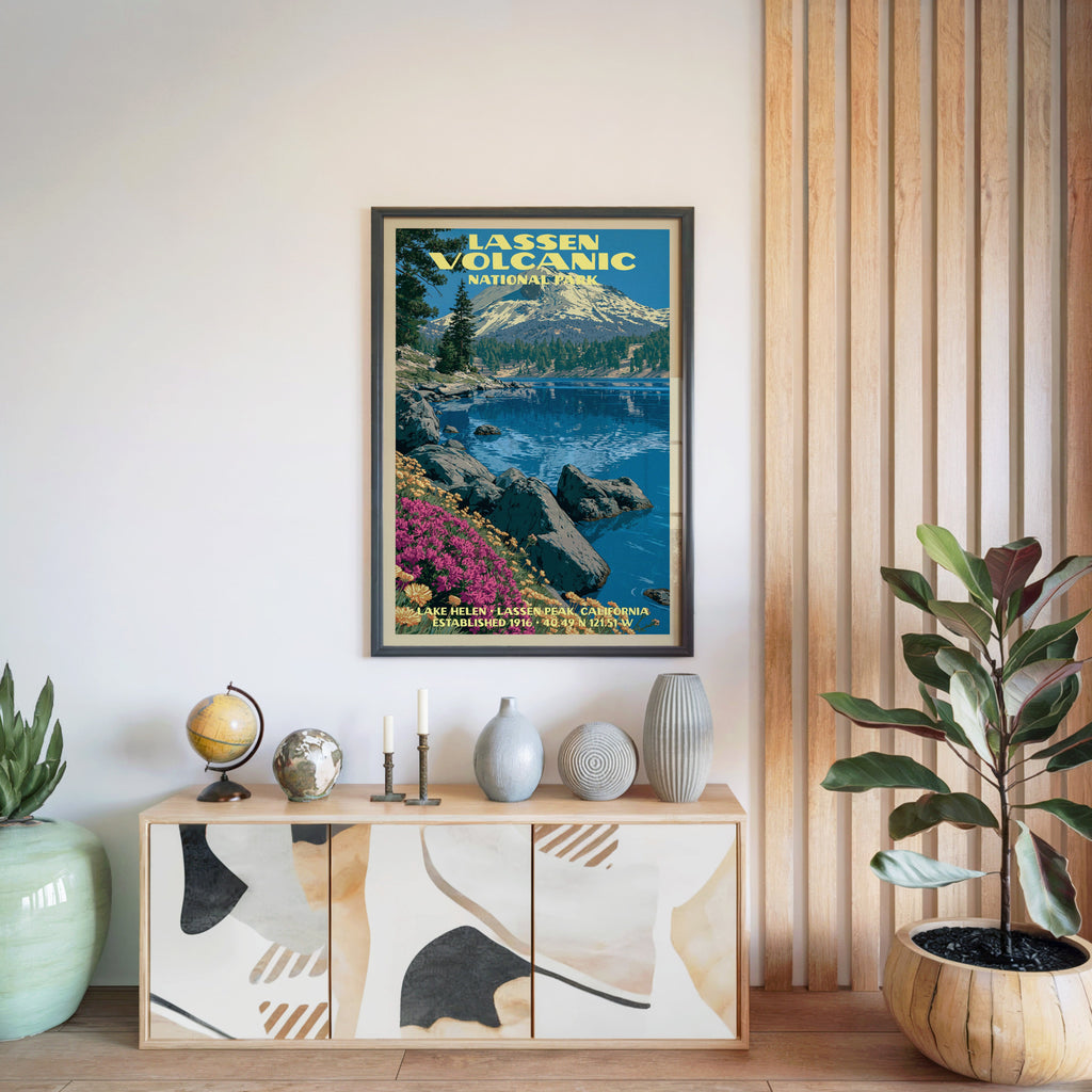 Lassen Volcanic National Park poster in a black frame above a light wood sideboard by a slatted wall panel