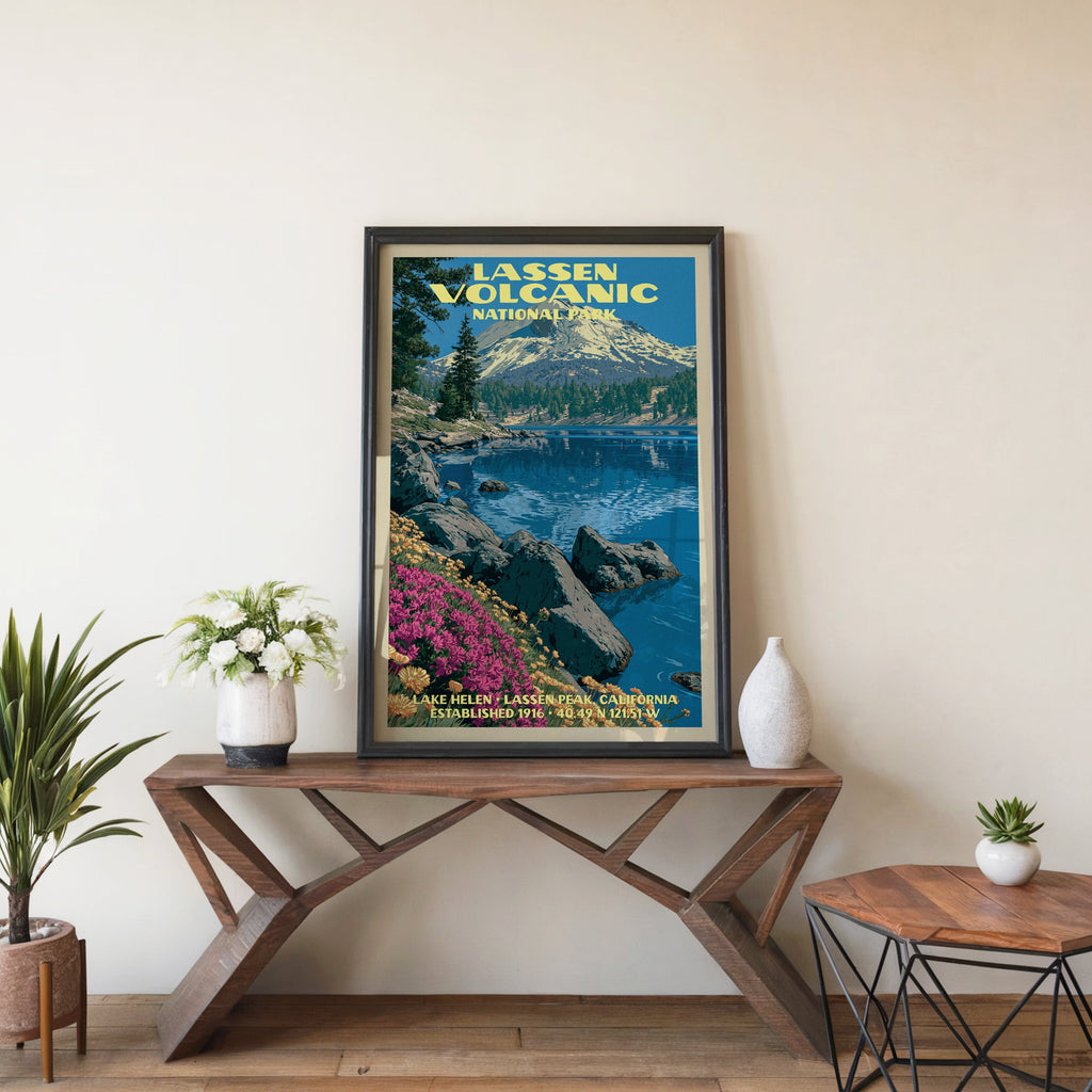 Lassen Volcanic Lake Helen wall art in black, leaning on a walnut console with white anemones and a vase