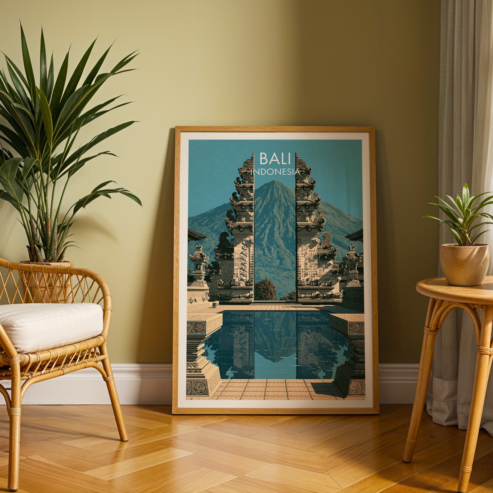 Large Lempuyang Temple Bali Indonesia travel print in an oak frame leaning on a herringbone floor next to a rattan chair
