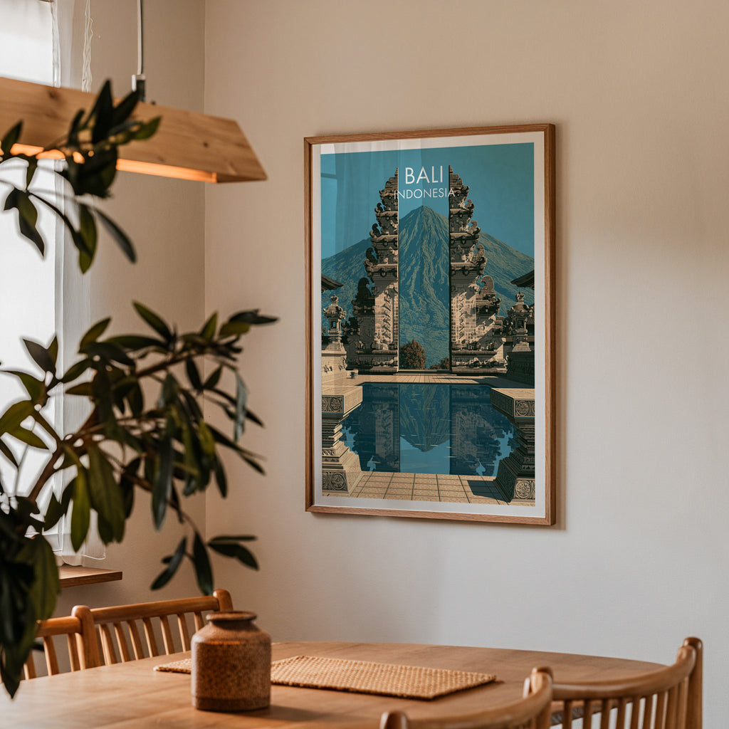 Framed Lempuyang Temple Bali Indonesia print on a dining room wall above an oak table in warm afternoon light