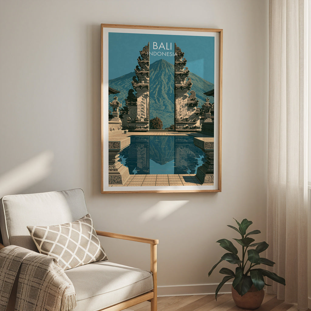 Lempuyang Temple Bali Indonesia travel print in a light oak frame on a living room wall beside a linen armchair