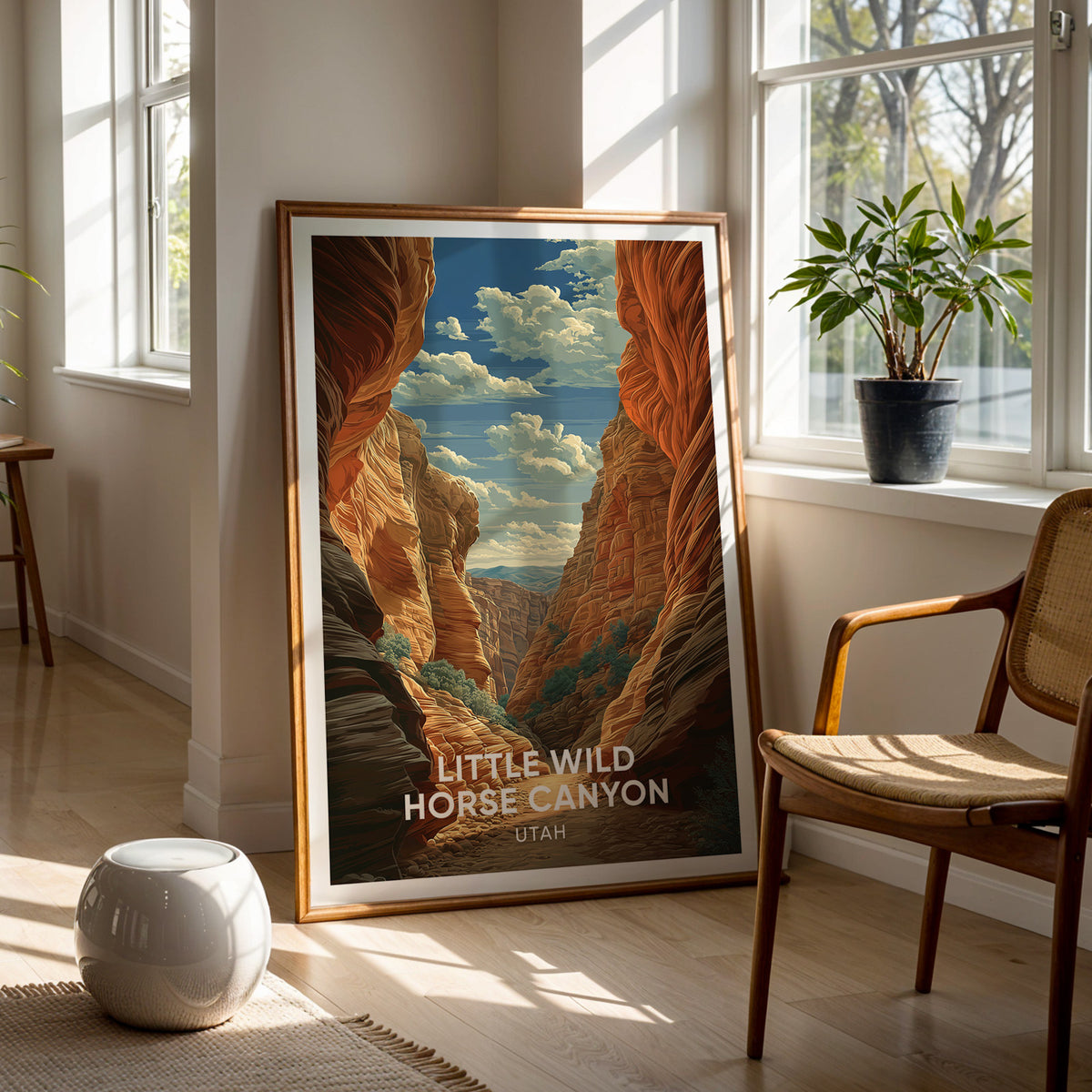Utah slot canyon print in oak on the floor of a two-window room with a woven chair and a globe lamp.