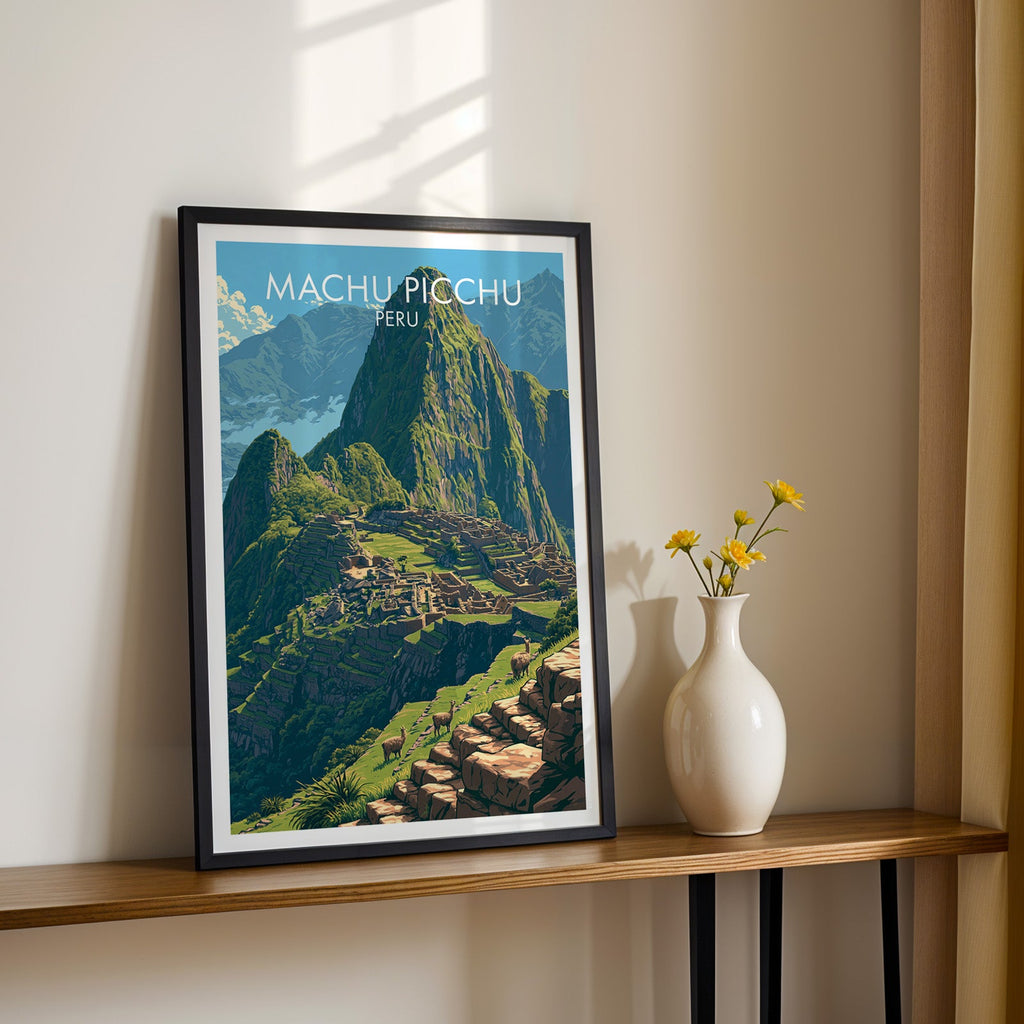 Huayna Picchu wall art in a black frame on a narrow wood shelf next to yellow daisies in a white vase